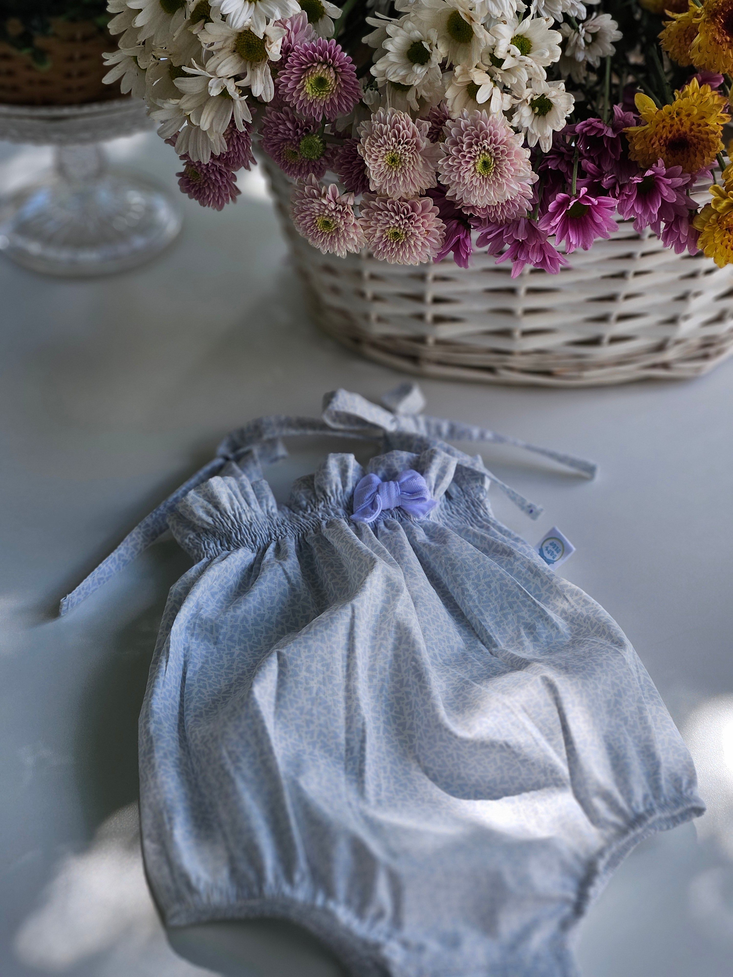 Body Pimpão Floral Azul Elastex